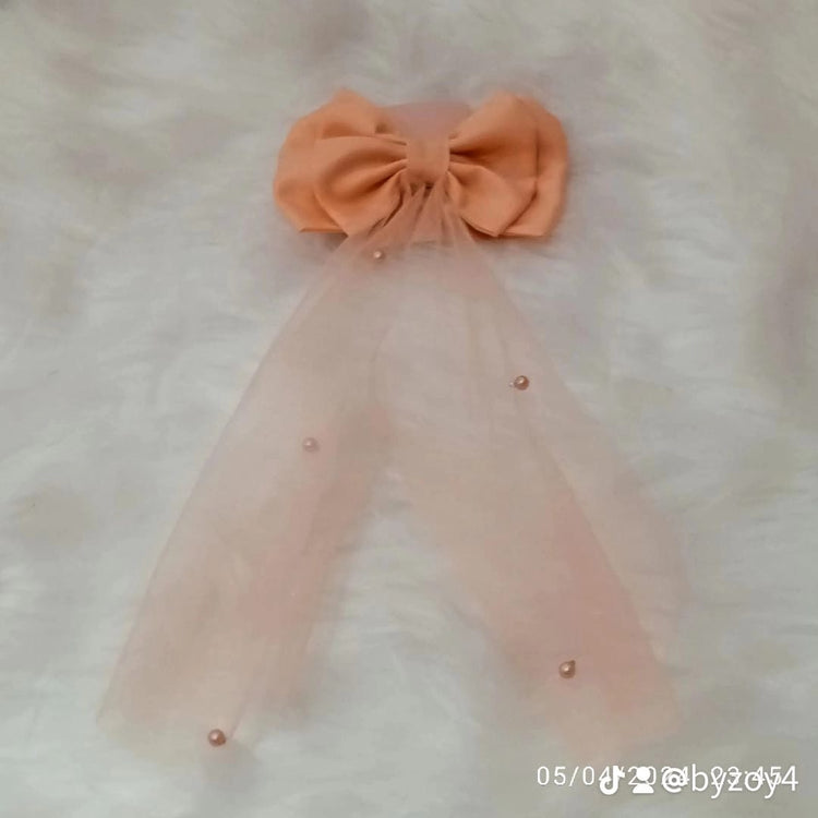 BEADED BOW