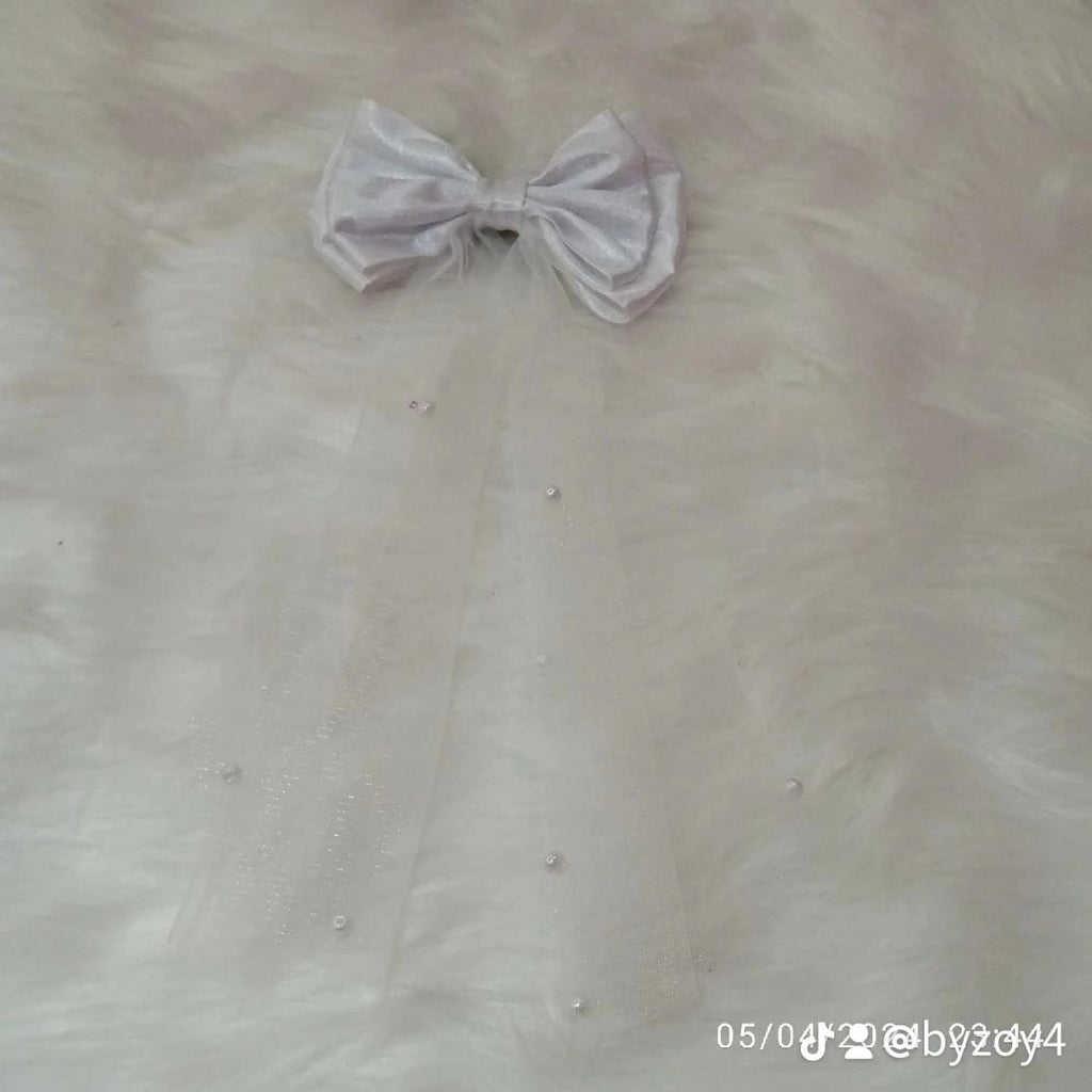 BEADED BOW
