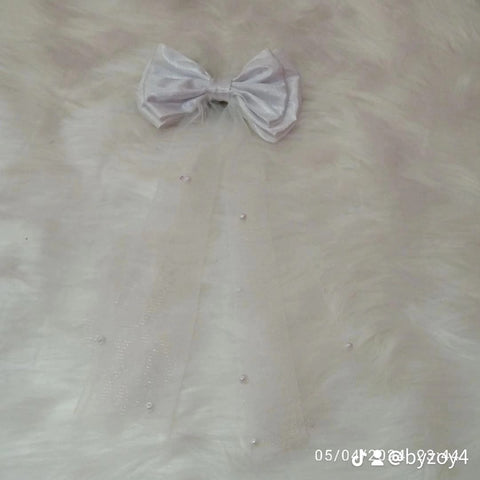 BEADED BOW