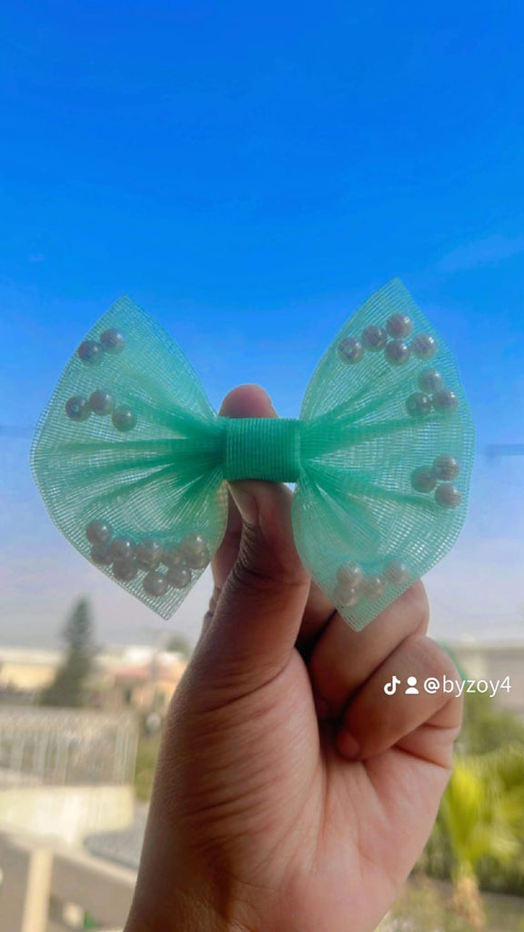 BEADED BOW