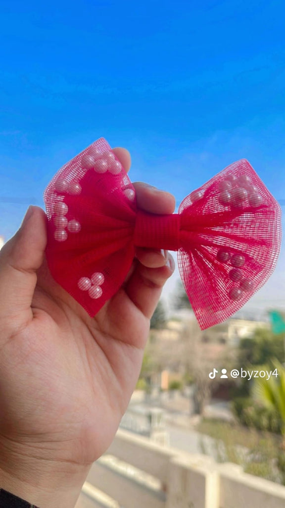 BEADED BOW